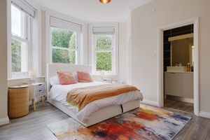 Bedroom One- click for photo gallery